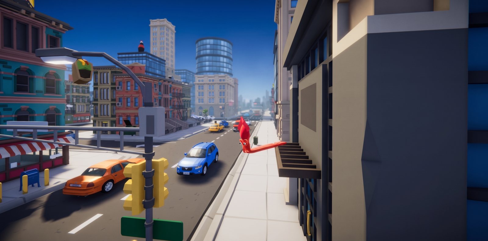 The squid clinging to a building wall high above city traffic
