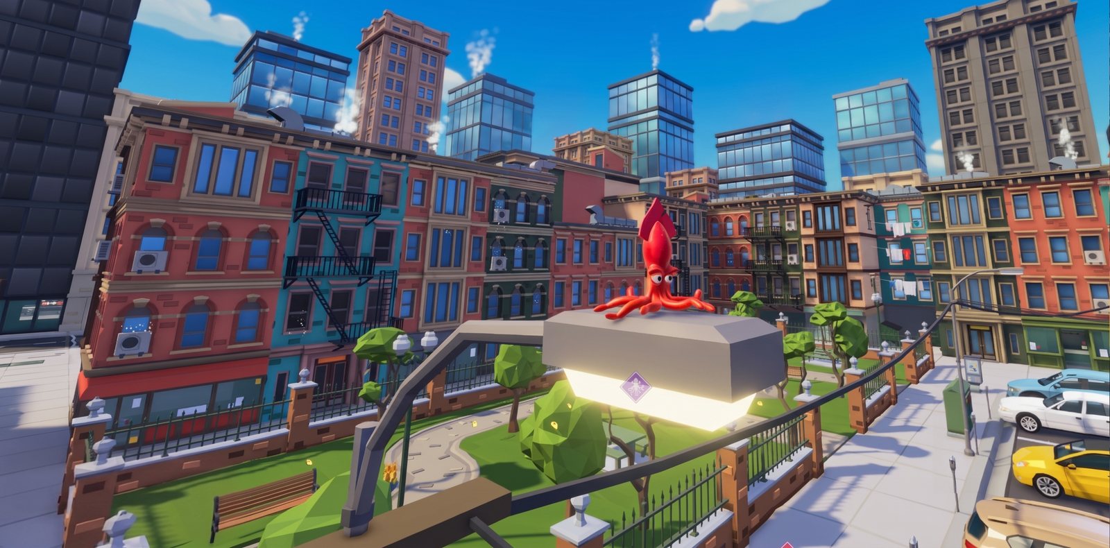 The squid perched on a lamp above a small city park